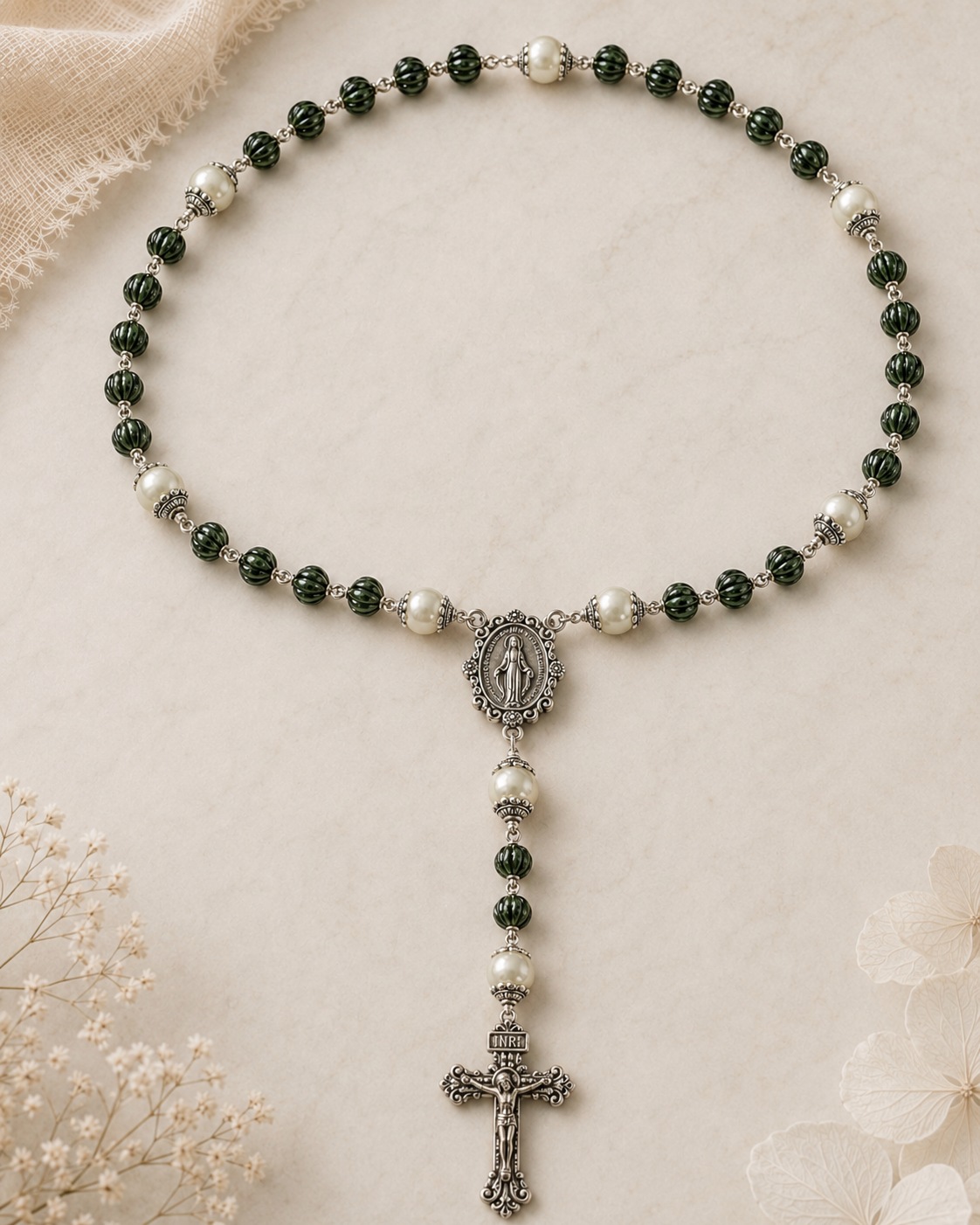 Tactile rosary with dark green ridged beads and pearl accents